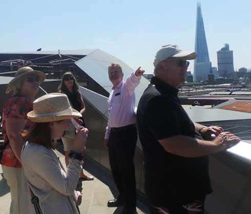 Richard Jones guiding a group on the rooftop of One New Change in the City of London.